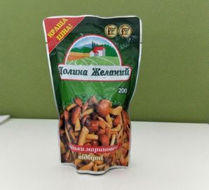 Natürlicher gesündester in Büchsen konservierter Champignon-Pilz ganz/Scheiben im Beutel